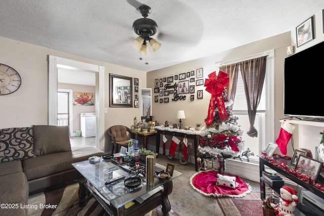 2733 Dumesnil St, Louisville, KY 40211 - living room featuring washer / clothes dryer, a ceiling fan, and a textured ceiling