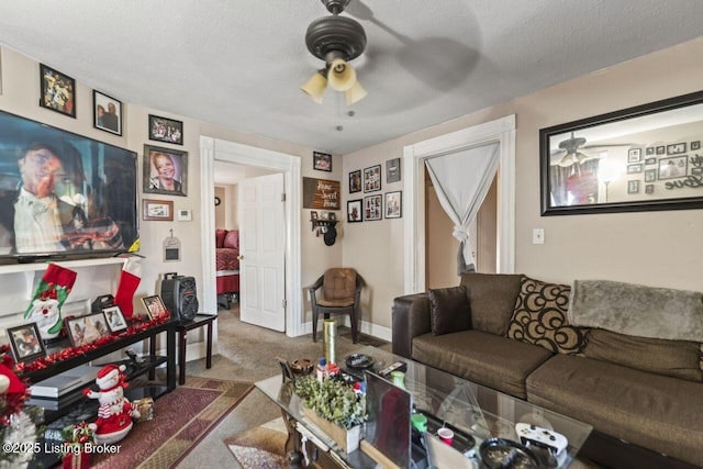 2733 Dumesnil St, Louisville, KY 40211 - living room featuring ceiling fan, carpet, and a textured ceiling
