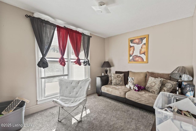 2733 Dumesnil St, Louisville, KY 40211 - living room featuring plenty of natural light and carpet flooring