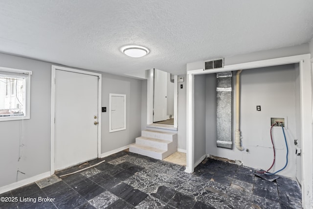 2733 Dumesnil St, Louisville, KY 40211 - foyer with stairway and a textured ceiling