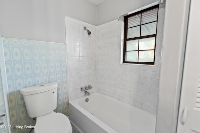 2733 Dumesnil St, Louisville, KY 40211 - bathroom with tile walls and shower / bathtub combination