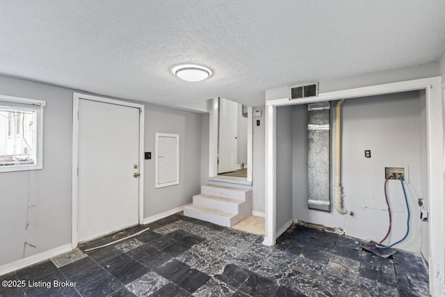 2733 Dumesnil St, Louisville, KY 40211 - foyer with stairway and a textured ceiling
