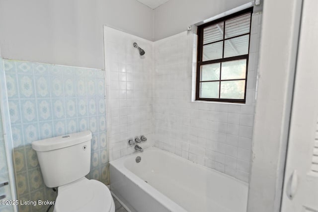 2733 Dumesnil St, Louisville, KY 40211 - full bathroom featuring tile walls and bathing tub / shower combination