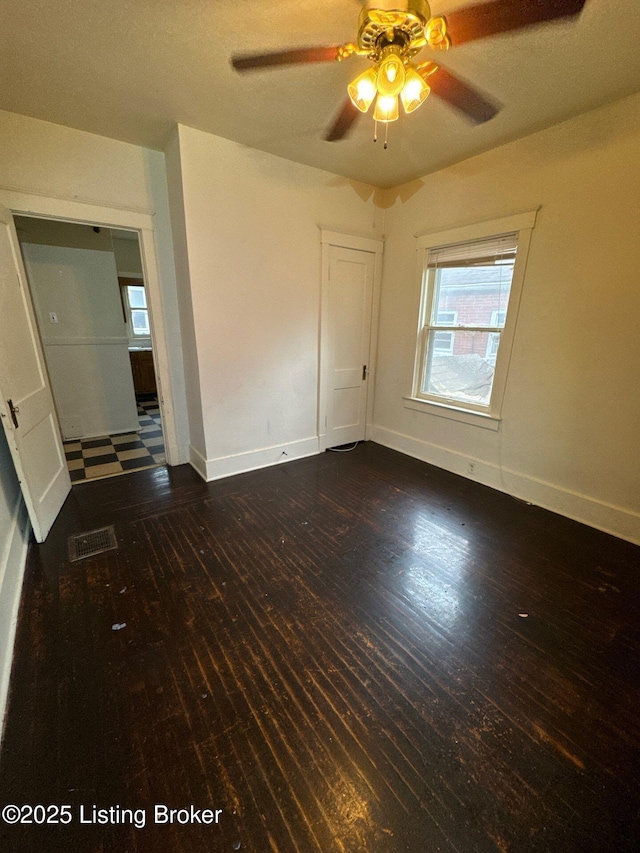 3 Eutropia Ct, Louisville, KY 40208 - empty room featuring wood-type flooring, a ceiling fan, and baseboards