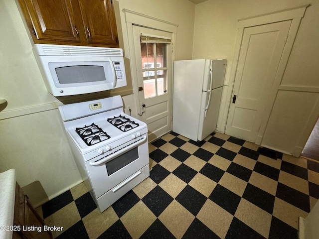 3 Eutropia Ct, Louisville, KY 40208 - kitchen with white appliances and light floors