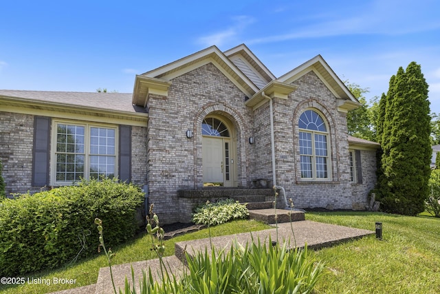 1400 Nightingale Ln, Goshen, KY 40026 - view of front facade with brick siding, a front lawn, and a patio