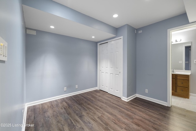 1400 Nightingale Ln, Goshen, KY 40026 - unfurnished bedroom featuring wood finished floors, baseboards, a closet, recessed lighting, and ensuite bathroom
