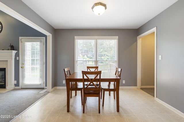 1400 Nightingale Ln, Goshen, KY 40026 - dining space featuring healthy amount of natural light, baseboards, and a high end fireplace