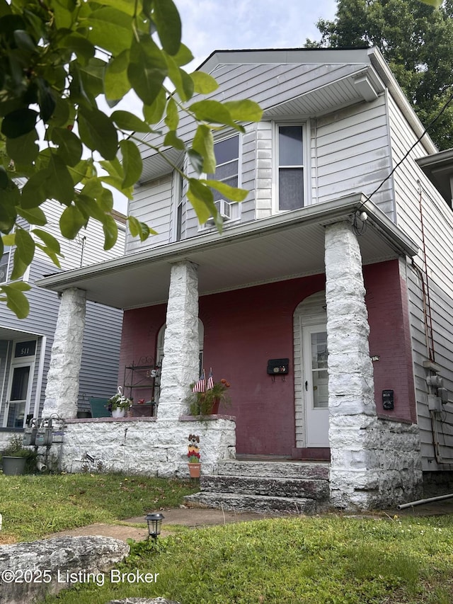 513 Camp St, Louisville, KY 40203 - view of front of home featuring a porch