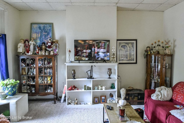 513 Camp St, Louisville, KY 40203 - living room with a paneled ceiling and carpet flooring