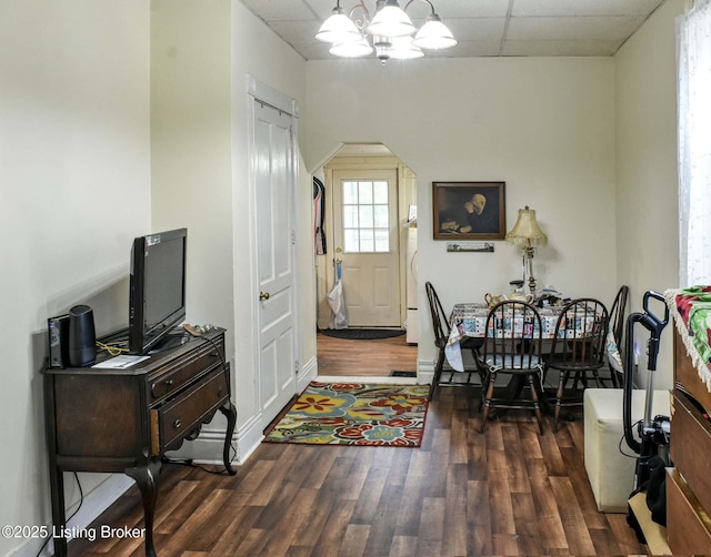 513 Camp St, Louisville, KY 40203 - foyer featuring a paneled ceiling, wood finished floors, and baseboards