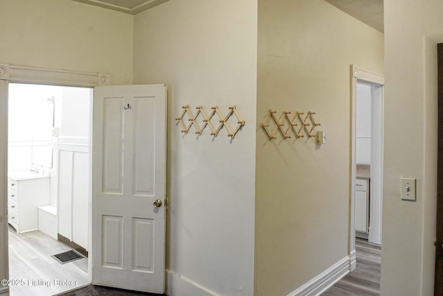513 Camp St, Louisville, KY 40203 - hall with wood finished floors and baseboards