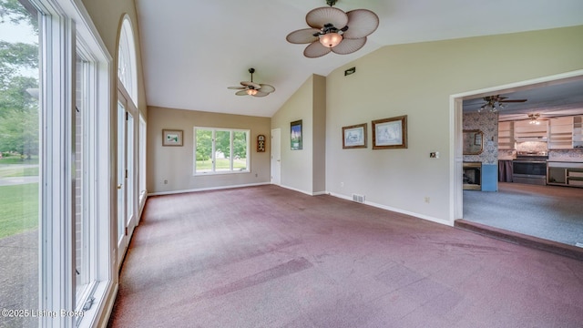 316 Short Rd, Louisville, KY 40207 - unfurnished living room featuring a ceiling fan, a fireplace, carpet, vaulted ceiling, and baseboards