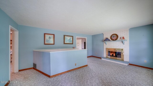 316 Short Rd, Louisville, KY 40207 - carpeted living area featuring a fireplace and baseboards