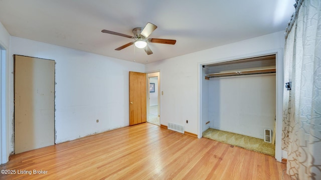 316 Short Rd, Louisville, KY 40207 - unfurnished bedroom featuring wood finished floors, a ceiling fan, and a closet