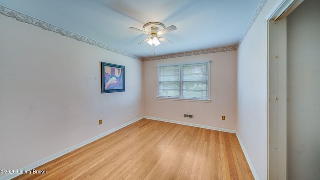 316 Short Rd, Louisville, KY 40207 - unfurnished room with light wood-type flooring, baseboards, ceiling fan, and ornamental molding