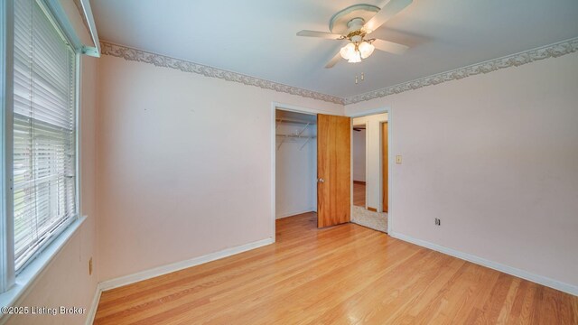 316 Short Rd, Louisville, KY 40207 - unfurnished bedroom with baseboards, light wood-style floors, a closet, and a ceiling fan
