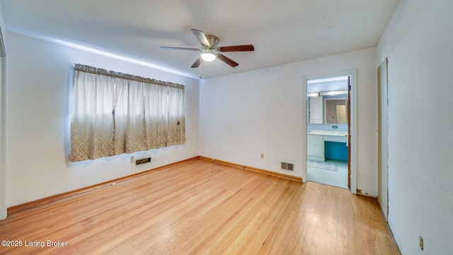 316 Short Rd, Louisville, KY 40207 - spare room with wood finished floors, a ceiling fan, and baseboards