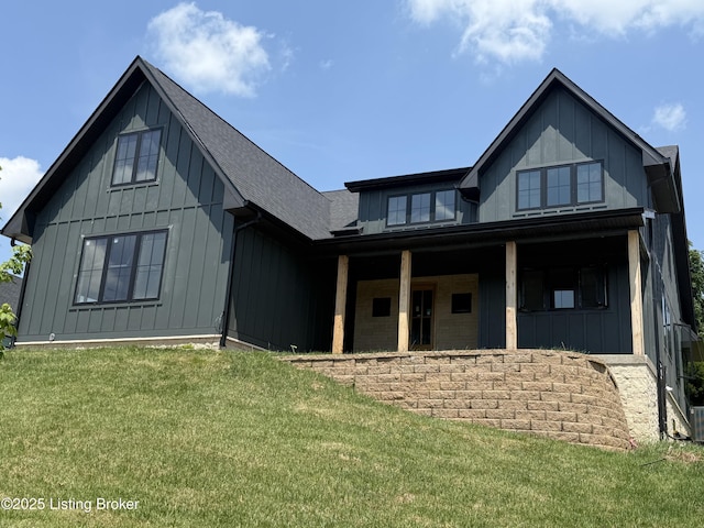 6609 Clore Lake Rd, Crestwood, KY 40014 - modern farmhouse style home with board and batten siding, covered porch, a front lawn, and a shingled roof