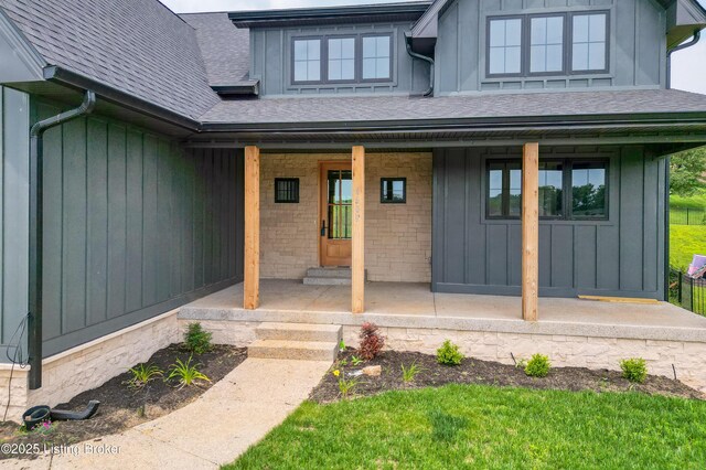 6609 Clore Lake Rd, Crestwood, KY 40014 - doorway to property with a porch, a shingled roof, and board and batten siding