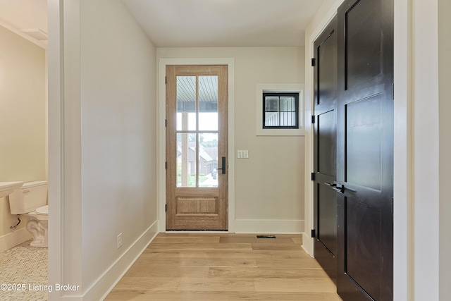 6609 Clore Lake Rd, Crestwood, KY 40014 - doorway featuring baseboards and light wood-style flooring