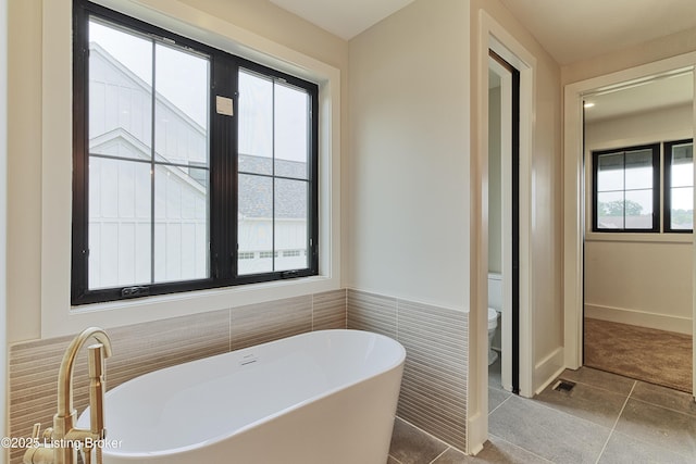 6609 Clore Lake Rd, Crestwood, KY 40014 - full bathroom with a freestanding bath and tile patterned flooring