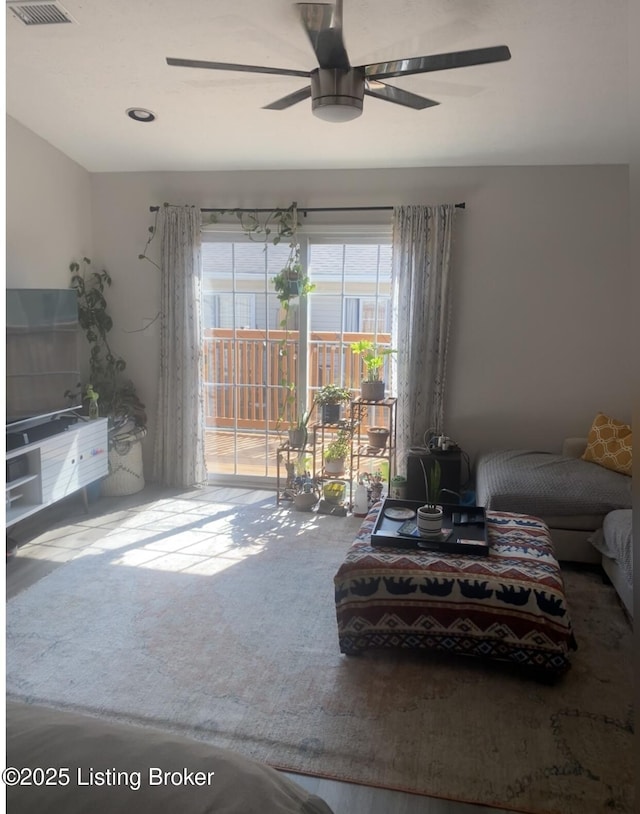 11919 Tazwell Dr Unit 7, Louisville, KY 40245 - living room featuring a ceiling fan and carpet floors