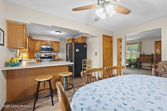 7419 Beahl Blvd, Louisville, KY 40258 - dining room with light wood-type flooring and a ceiling fan