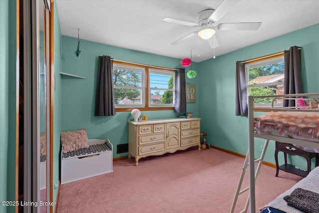 7419 Beahl Blvd, Louisville, KY 40258 - bedroom with multiple windows, carpet flooring, a ceiling fan, and a textured ceiling