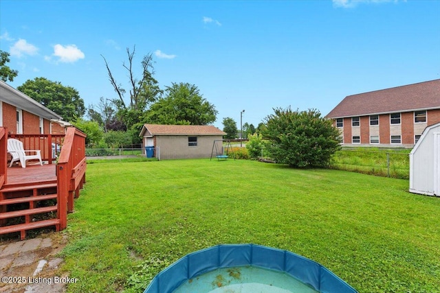 7419 Beahl Blvd, Louisville, KY 40258 - fenced backyard with a storage unit and a wooden deck