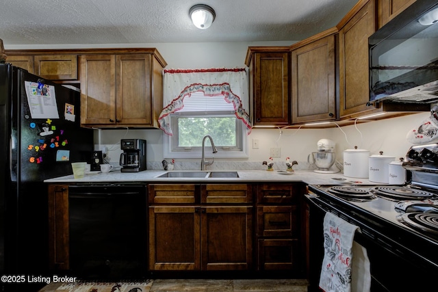 14499 S S Highway 259, Leitchfield, KY 42754 - kitchen featuring black appliances, light countertops, and a textured ceiling