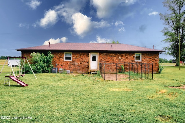 14499 S S Highway 259, Leitchfield, KY 42754 - back of property featuring brick siding, a playground, and a yard