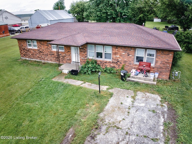 14499 S S Highway 259, Leitchfield, KY 42754 - ranch-style house with roof with shingles, brick siding, and a front yard