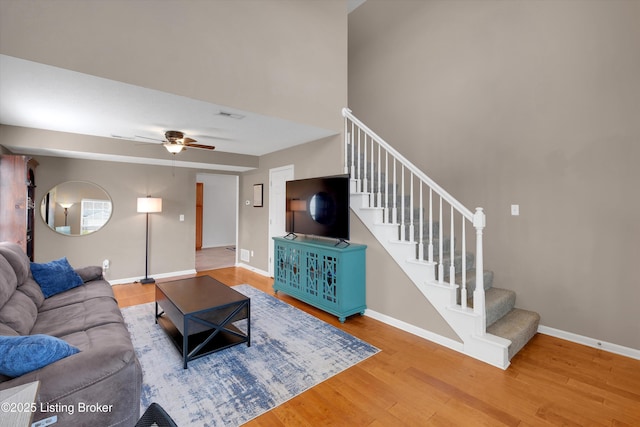 204 Greenleaf Dr, Elizabethtown, KY 42701 - living area featuring wood finished floors, stairway, and baseboards