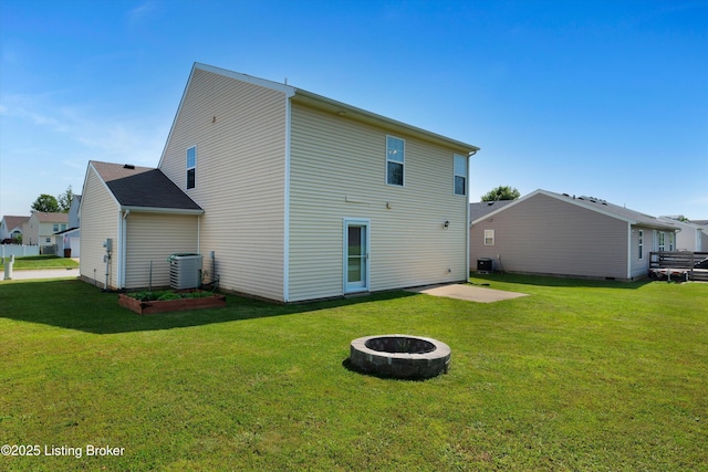 204 Greenleaf Dr, Elizabethtown, KY 42701 - rear view of property featuring an outdoor fire pit, a yard, and central air condition unit