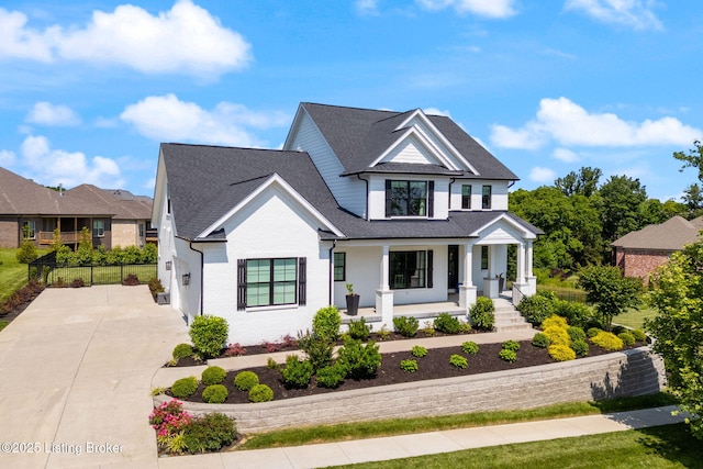 17716 Shakes Creek Dr, Fisherville, KY 40023 - view of front facade featuring a porch, driveway, roof with shingles, and an attached garage
