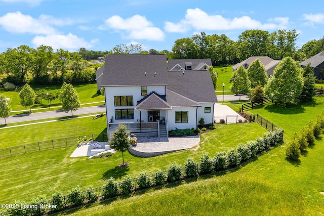 17716 Shakes Creek Dr, Fisherville, KY 40023 - rear view of property featuring roof with shingles, stucco siding, and view of wooded area