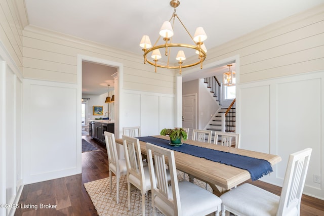 17716 Shakes Creek Dr, Fisherville, KY 40023 - dining room with a chandelier, a decorative wall, healthy amount of natural light, stairway, and dark wood-style flooring