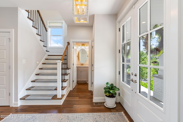 17716 Shakes Creek Dr, Fisherville, KY 40023 - entrance foyer with baseboards, stairway, wood finished floors, a chandelier, and french doors