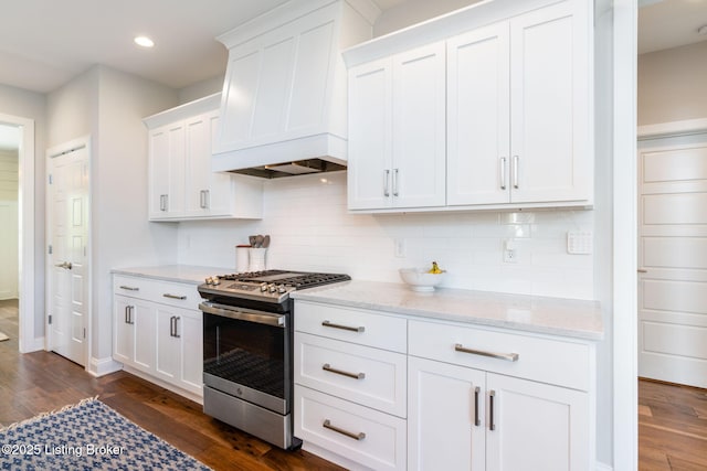 17716 Shakes Creek Dr, Fisherville, KY 40023 - kitchen featuring stainless steel gas range oven, premium range hood, white cabinets, dark wood-style flooring, and recessed lighting