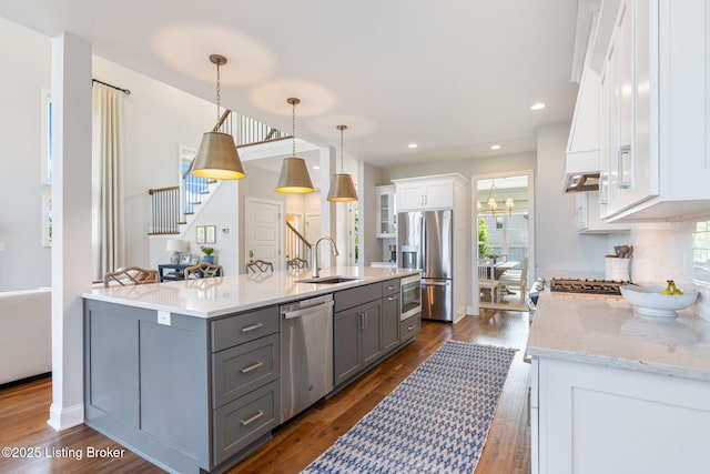 17716 Shakes Creek Dr, Fisherville, KY 40023 - kitchen featuring appliances with stainless steel finishes, a sink, gray cabinetry, white cabinets, and dark wood finished floors