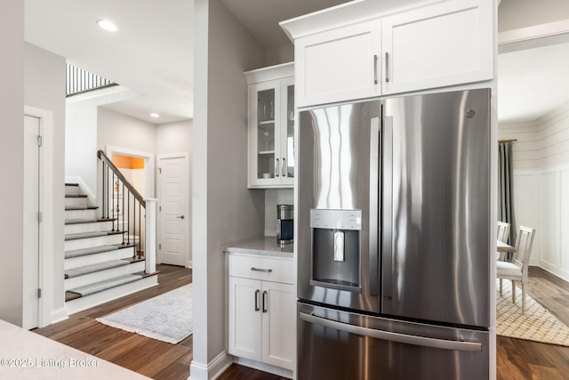 17716 Shakes Creek Dr, Fisherville, KY 40023 - kitchen featuring stainless steel fridge with ice dispenser, dark wood-style floors, glass insert cabinets, white cabinetry, and recessed lighting