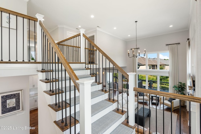 17716 Shakes Creek Dr, Fisherville, KY 40023 - stairs featuring wood finished floors, a high ceiling, a chandelier, recessed lighting, and ornamental molding
