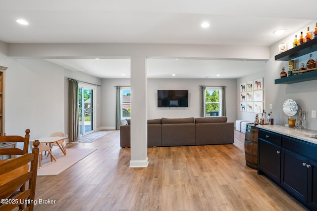 17716 Shakes Creek Dr, Fisherville, KY 40023 - living area with recessed lighting, light wood finished floors, and a bar