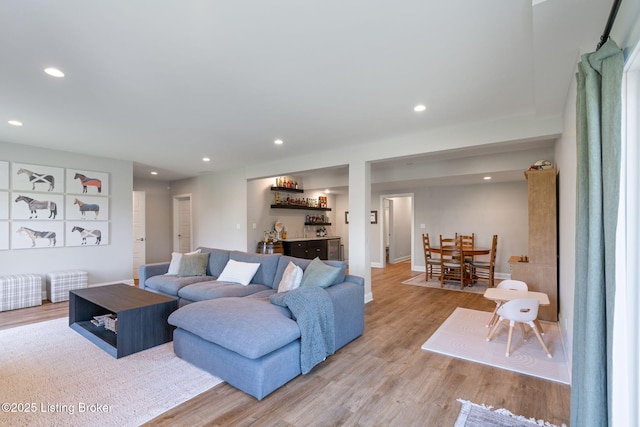 17716 Shakes Creek Dr, Fisherville, KY 40023 - living area with a dry bar, light wood-type flooring, recessed lighting, and baseboards
