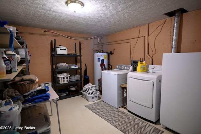 1025 Lake Rd, Campbellsburg, KY 40011 - laundry room with water heater, washer and clothes dryer, and a textured ceiling