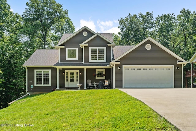 162 Penny Royal Ln, Brandenburg, KY 40108 - view of front of property with concrete driveway, a garage, a porch, a front lawn, and a shingled roof