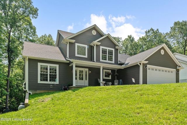 162 Penny Royal Ln, Brandenburg, KY 40108 - traditional-style home featuring an attached garage, a front yard, roof with shingles, and covered porch