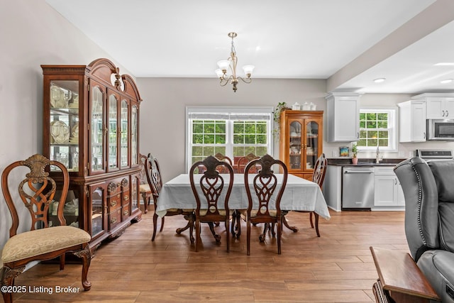 162 Penny Royal Ln, Brandenburg, KY 40108 - dining space featuring a chandelier, light wood-style flooring, and recessed lighting
