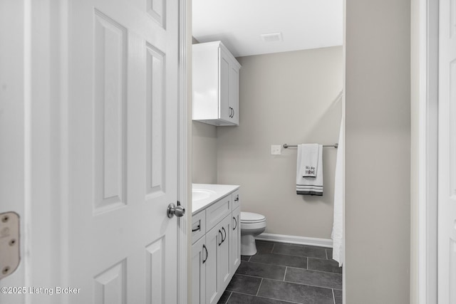 162 Penny Royal Ln, Brandenburg, KY 40108 - bathroom with vanity, toilet, baseboards, and tile patterned flooring